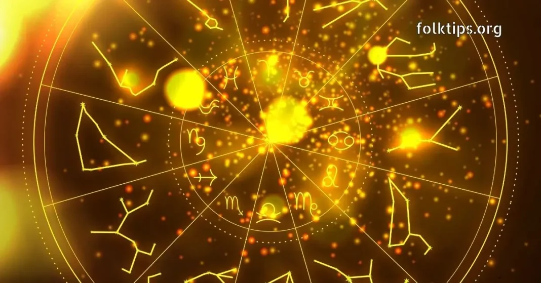 Golden zodiac wheel with astrology symbols and constellations on a glowing background.