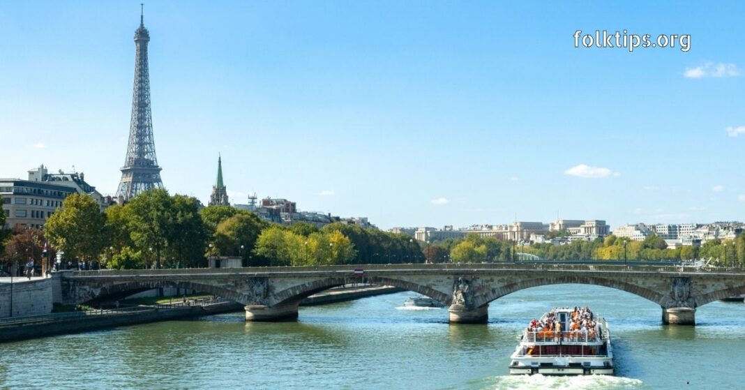 Seine River Cruise View, Paris Paris river cruise on the Seine with Eiffel Tower in background.