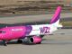 Wizz Air Georgia: გზამკვლევი – ჭკვიანური მოგზაურობა ქუთაისიდან Wizz Air Plane on Runway Tarmac