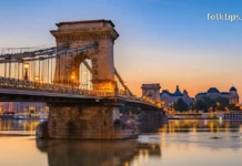 ბუდაპეშტი: ევროპის “პატარა პარიზი” – როგორ ვიმოგზაუროთ ბიუჯეტურად და რისი ნახვა ღირს? ბუდაპეშტის ჯაჭვის ხიდი მზის ჩასვლისას, დუნაის ხედი.